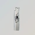 The Neo-Arachnid Silver Lighter—metal lighter with neo-Arachnid Silver Lighter.