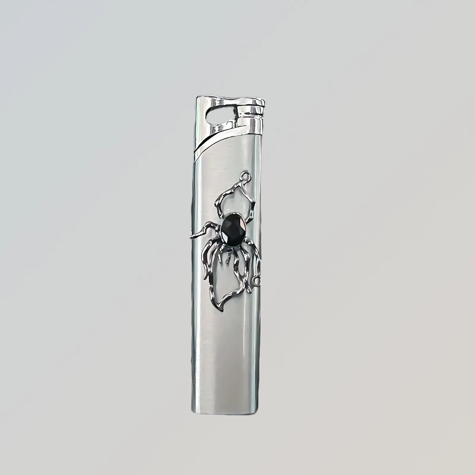 The Neo-Arachnid Silver Lighter—metal lighter with neo-Arachnid Silver Lighter.
