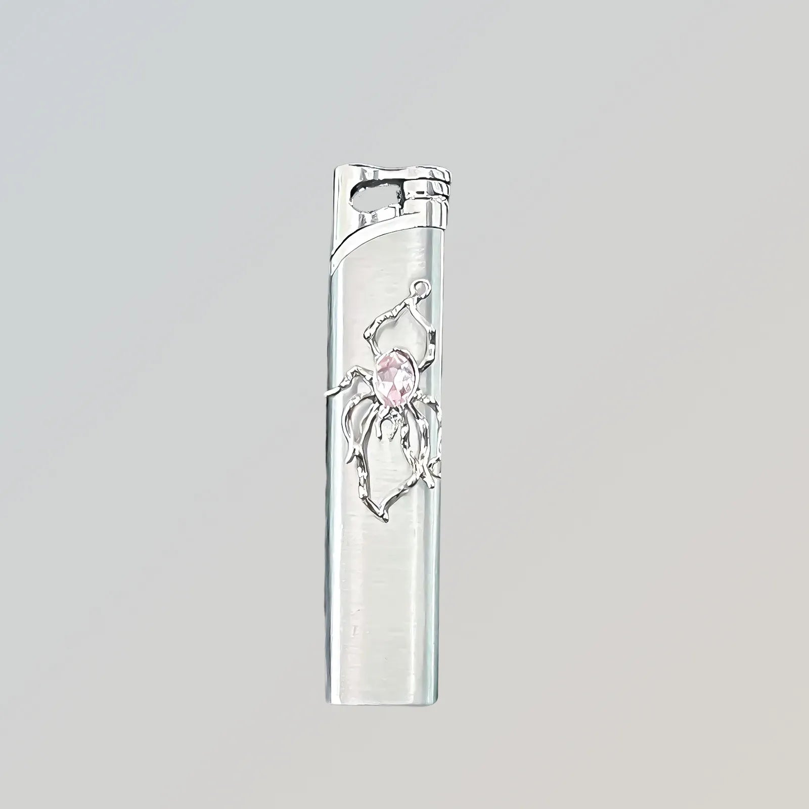 The Rose Arachnid Lighter: metal lighter featuring rose Arachnid Lighter.