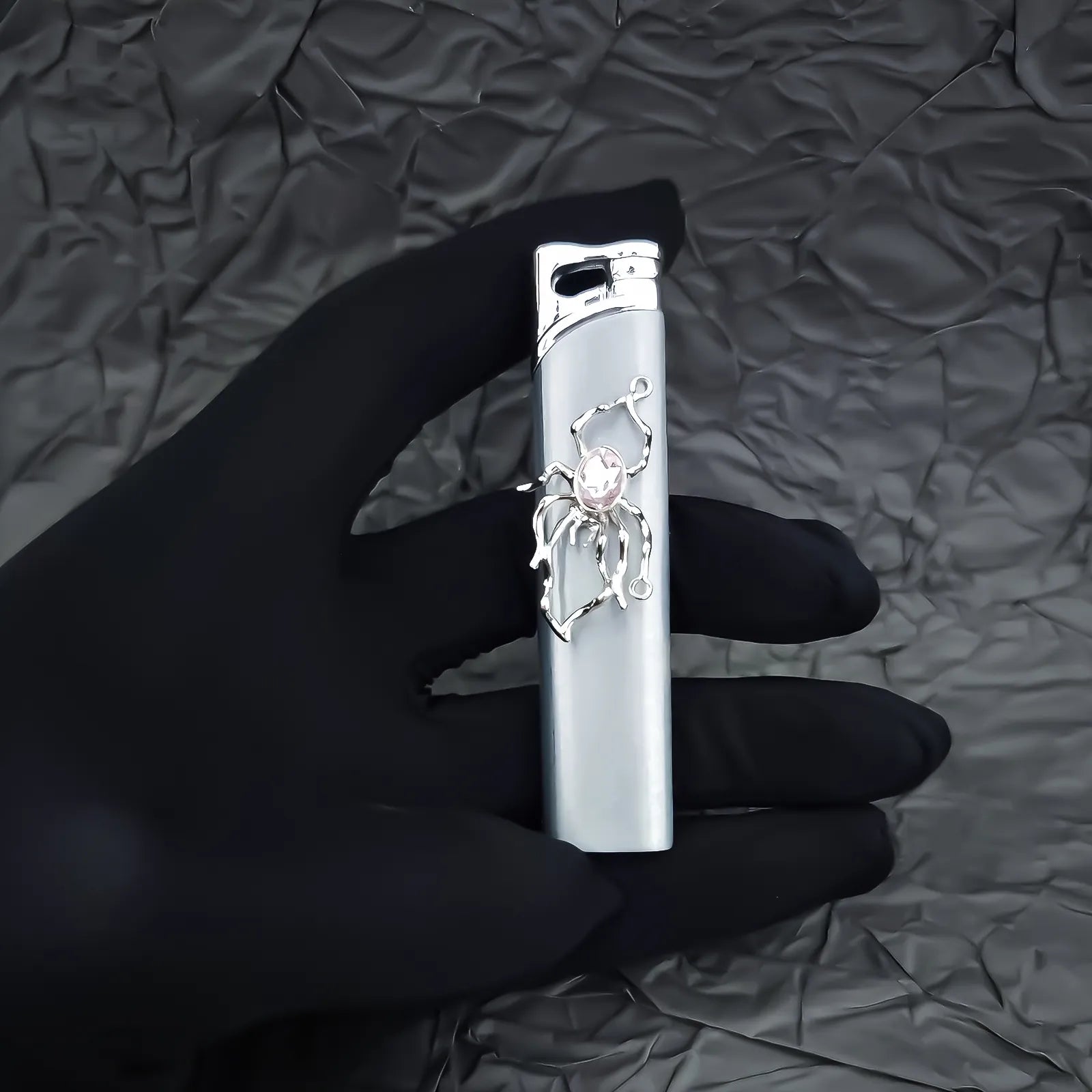 The Rose Arachnid Lighter: metal lighter featuring rose Arachnid Lighter.